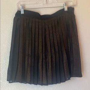 Golden and black mini skirt